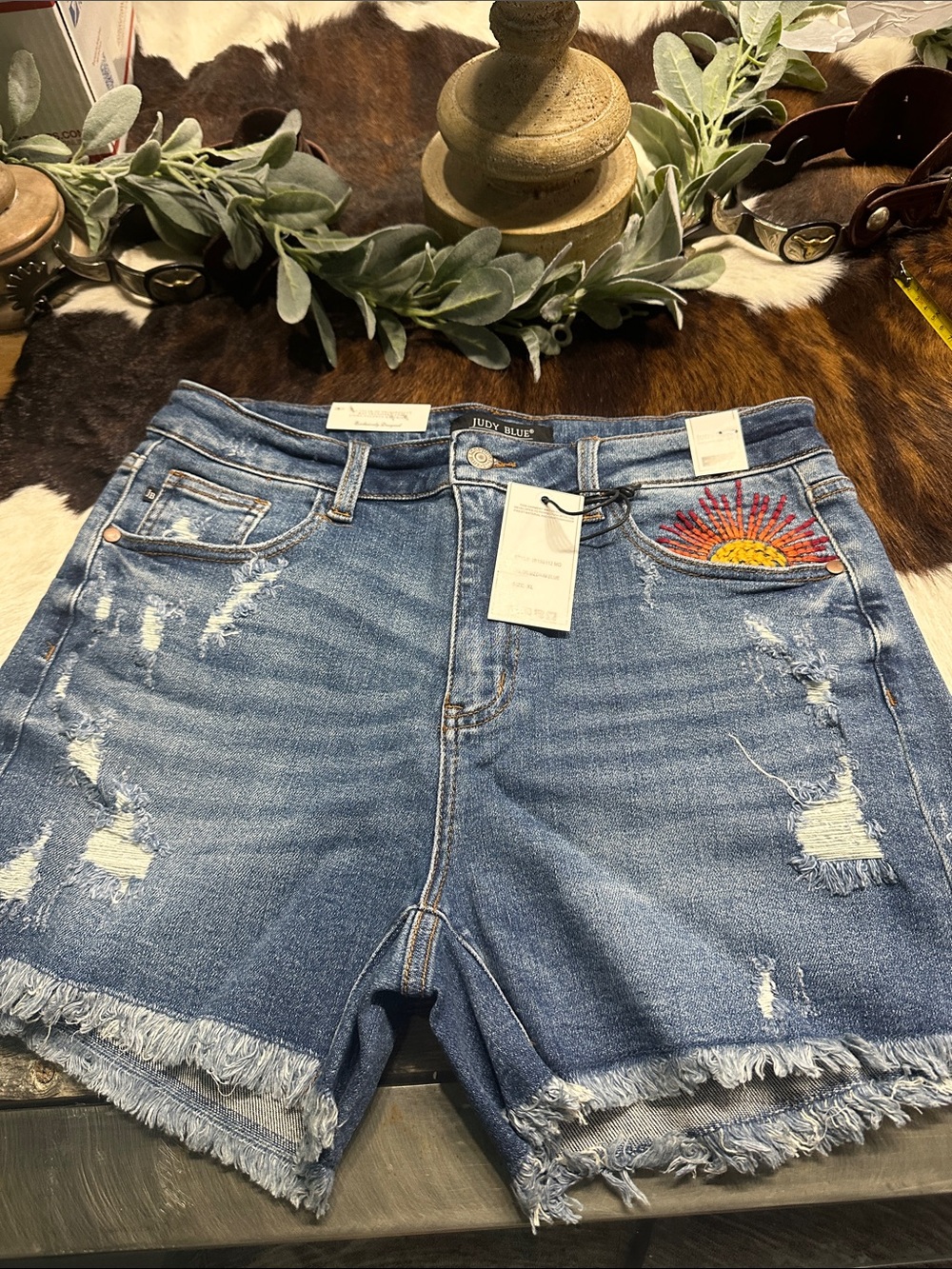 NWT Judy Blue Blue Distressed Denim Shorts with Embroidered Sunburst